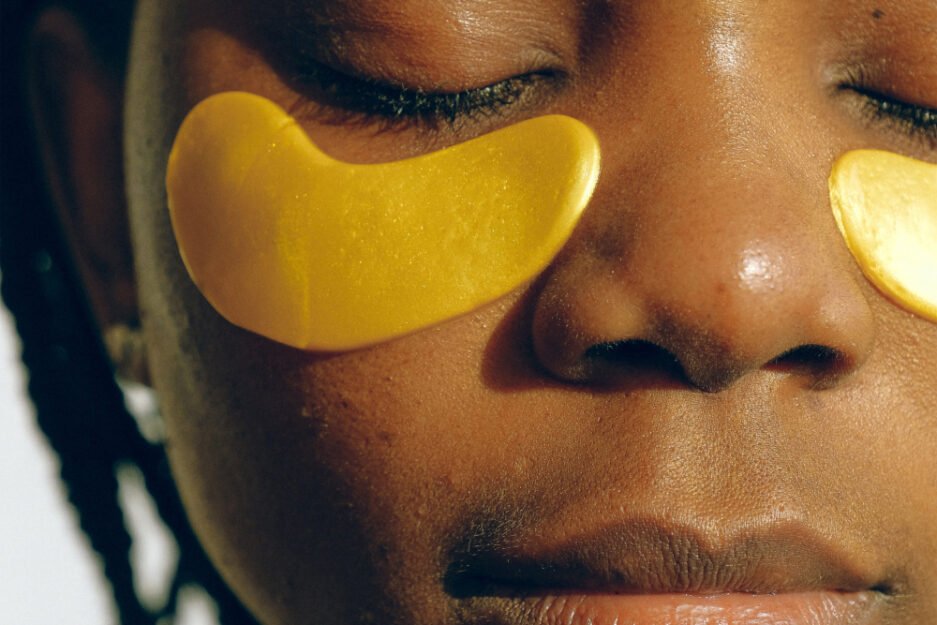 woman with eye mask patches under here eyes