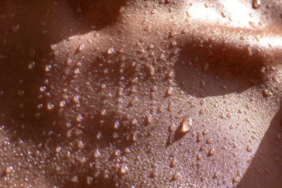 water droplets on bare skin