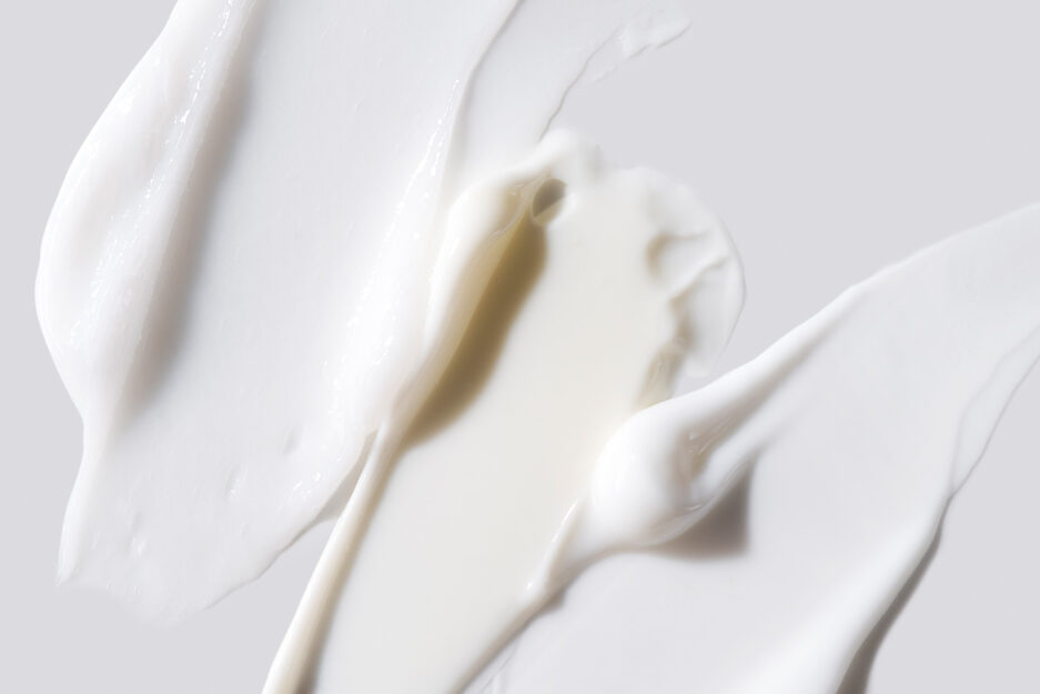 white cream smeared on a white surface